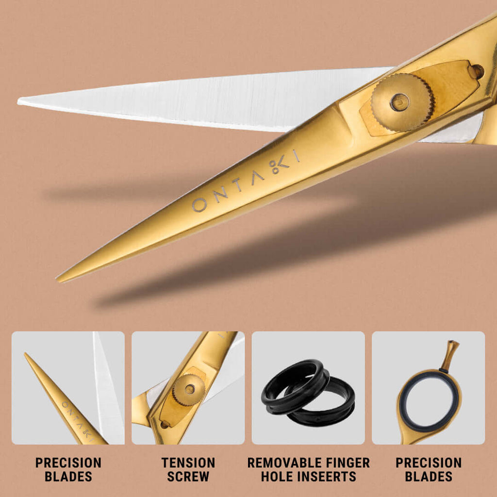 Gold scissors with features highlighted on a beige background