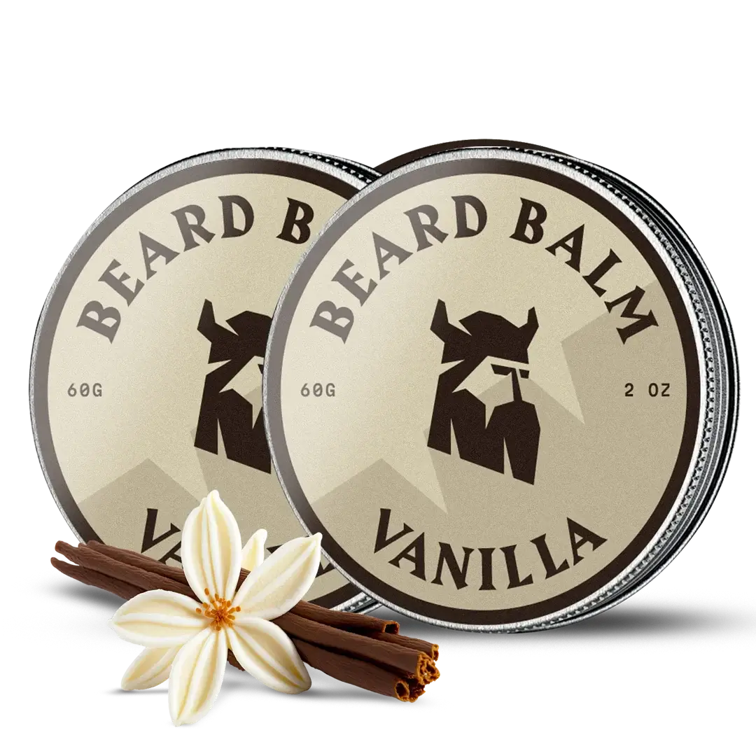 Two tins of vanilla beard balm with a vanilla flower and cinnamon stick on a white background