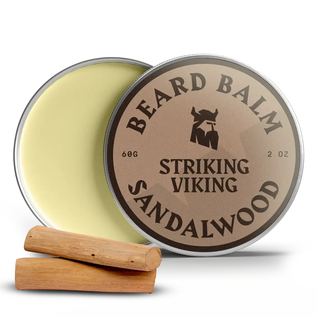 Beard balm container labeled 'Striking Viking Sandalwood' with a wooden applicator on a white background