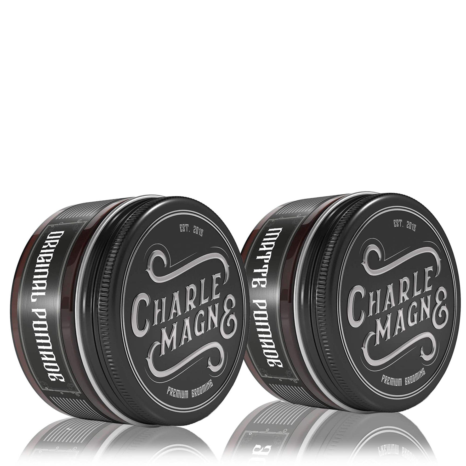 Premium Charlemagne hair pomade bundle with matte and original pomades, tins showcased.
